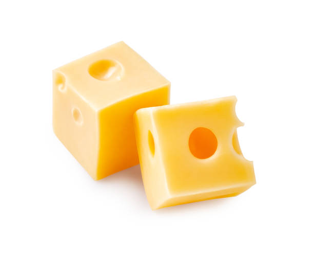 two cheese cubes isolated on white background. - dairy farm dairy product emmental cheese cheese imagens e fotografias de stock