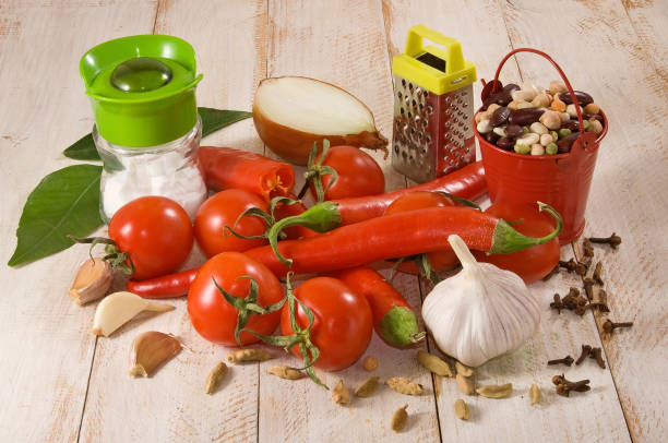 istock image of vegetables for salad and spices on a table close-up 1193354948