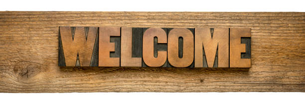 istock welcome sign in wood type 1193356753