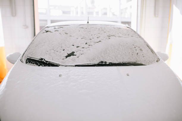 istock White car at the sink in the foam 1193359243