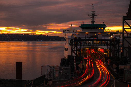 Sunset on elliott bay with a ferry.