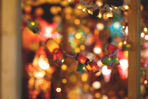 istock Paper multi-colored lanterns at the Christmas market. 1193364729