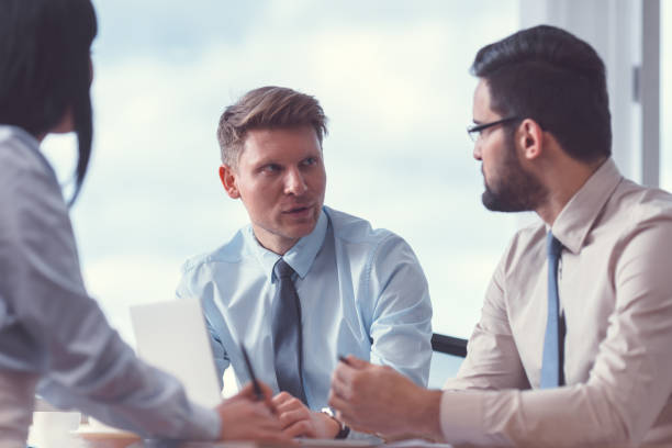 istock Young businesspeople at meeting 1193365322