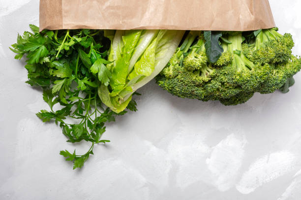 istock Variety of fresh green vegetables 1193366122