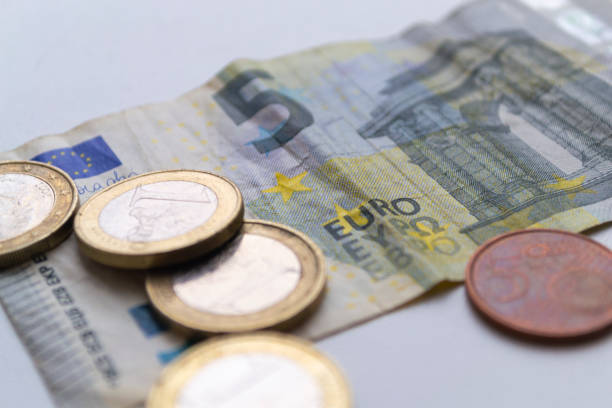 istock Euro coins on light blurred background. Macro shot 1193366581