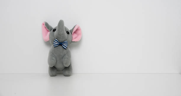 Cute Baby Elephant Toy Isolated on a White