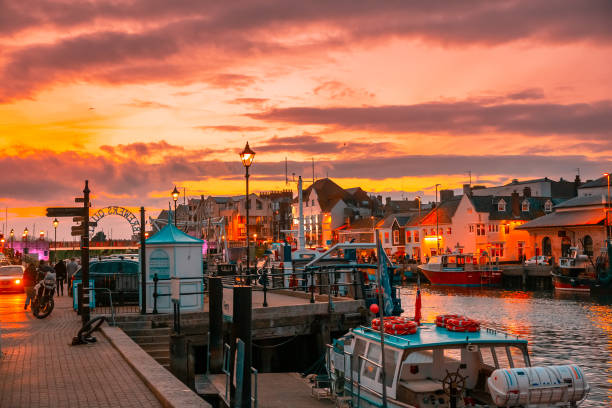 istock Dorset weymouth harbour at sunset 1193368852
