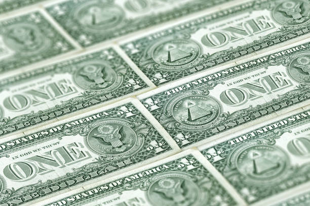 istock USD. Closeup American dollars banknotes background 1193370088