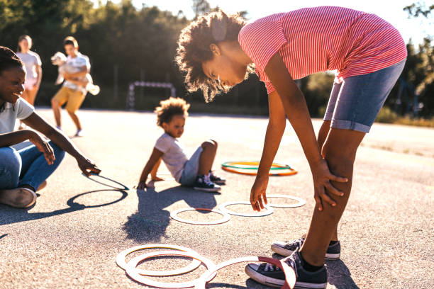 istock Playful kids on playground on sunny day 1193370261