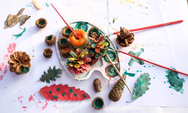 istock High angle view art and craft with pine cones and other forest fruit 1193370529