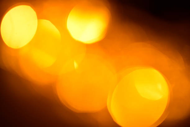istock Bright yellow lights bokeh blur background. 1193370734