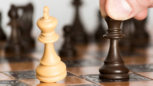 istock Chess photographed on a chessboard 1193371434