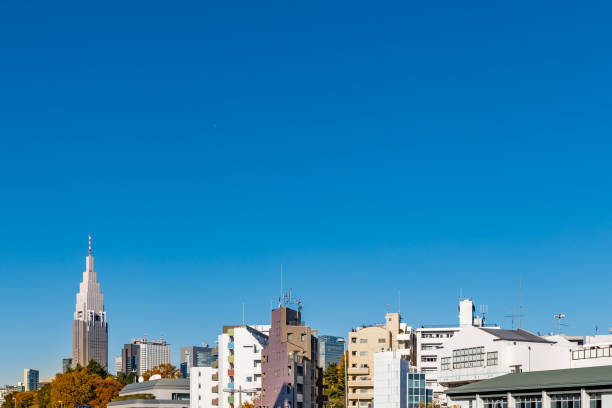 istock Urban buildings and blue sky 1193379999
