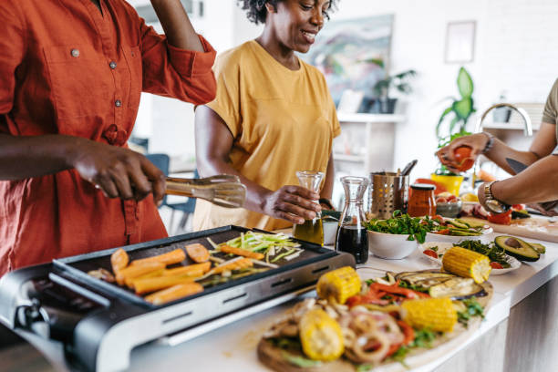 istock Teamwork for preparation of healthy meal 1193382587
