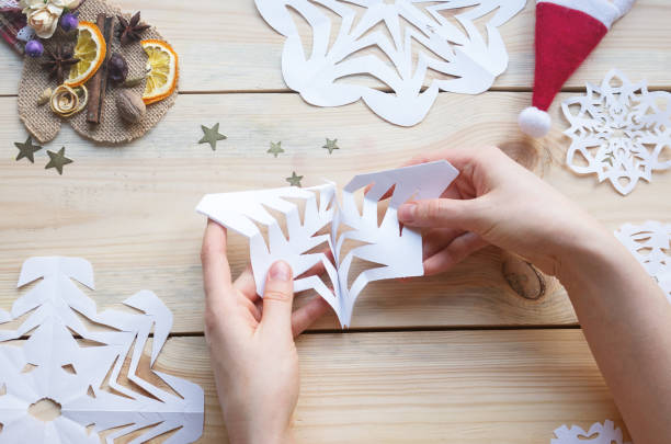 istock homemade snowflakes 1193383517