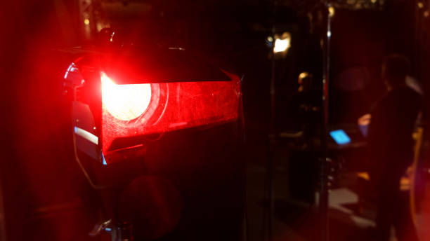 istock Professional red video light on dark background. Selective focus and blur. 1193384770