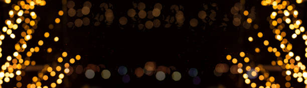 istock bright illuminated frame work graphic design wallpaper pattern picture with a lot glares bokeh and sparkles on black background with empty copy space for your text here 1193386736
