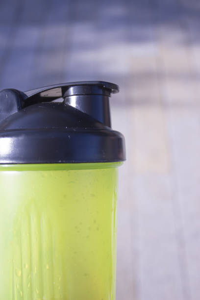 istock Transparent yellow shaker for sports drinks 1193388928