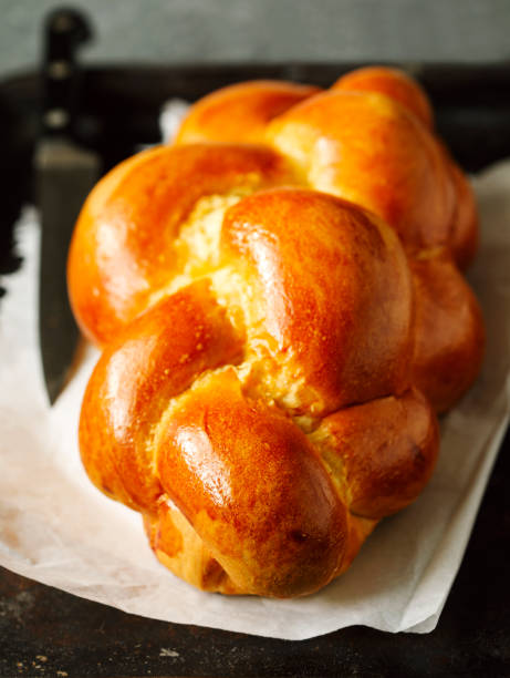 istock Freshly baked sweet braided bread loaf.  Challah bread 1193392454