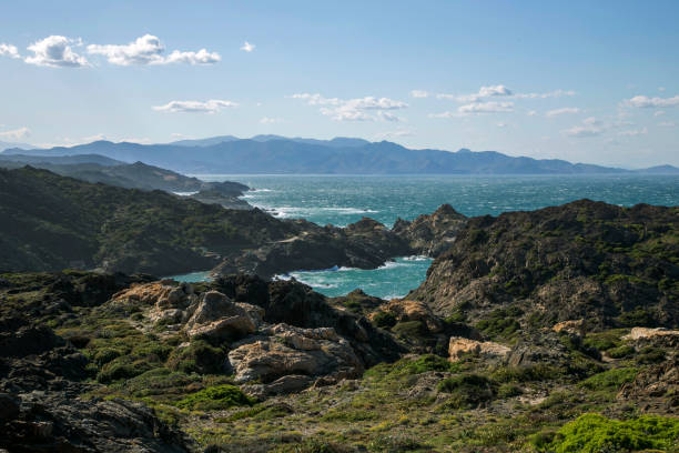 Windy day in Cap de Creus, Costa Brava North east of Spain, catalonia. Dramatic rocks and cliffs over troubled waters cap de creus stock pictures, royalty-free photos & images