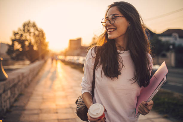 Nerdy girl walking home after lectures