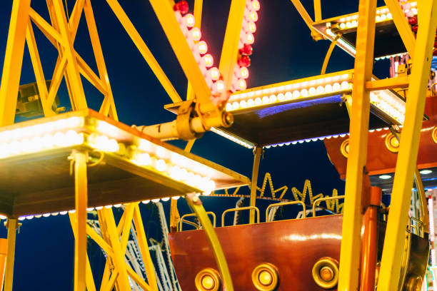 istock ferris wheel at night time 1193398346