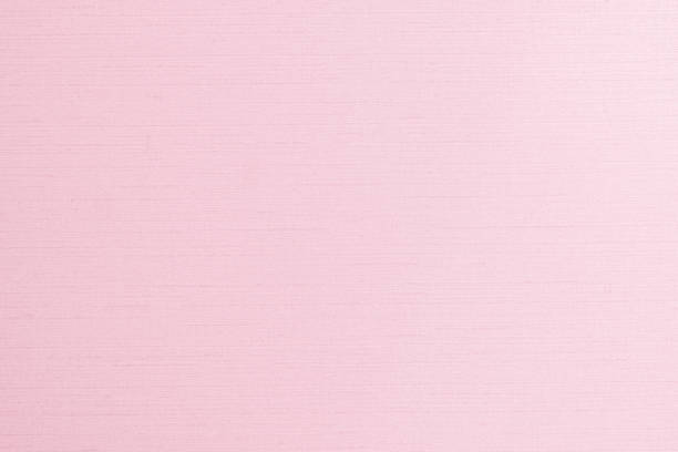 istock Silk blended cotton fabric wallpaper texture pattern background in light pale sweet pink color 1193399282