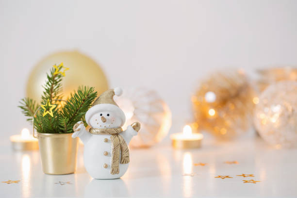istock Christmas decorations with little ceramic snowman 1193399627