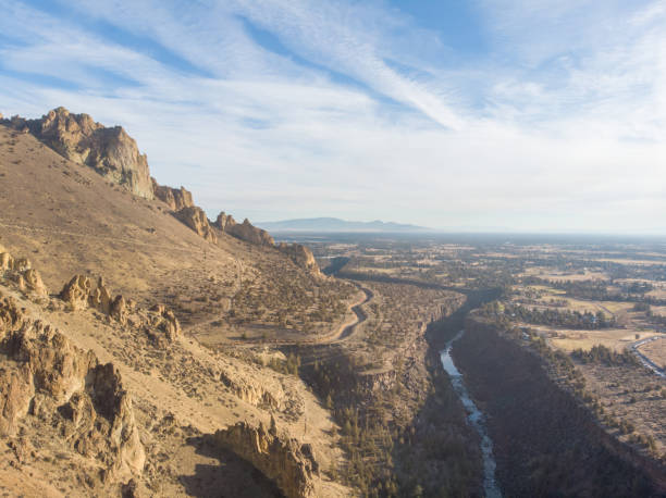 istock Rocks in a beautiful, beautiful canyon, desert river, Smith Rock State Park, Oregon, top view 1193403473