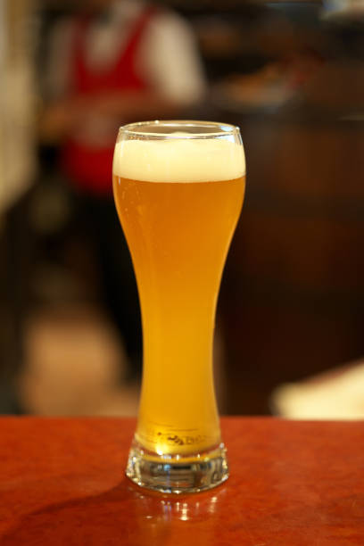 istock Glass of beer on a table in a bar 1193405088