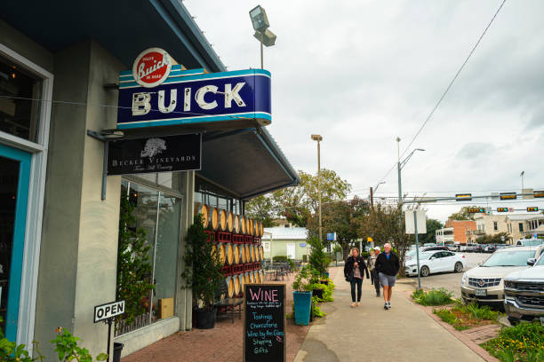 Fredericksburg Cityscape Fredericksburg, Texas USA - October 28, 2019: Cityscape storefront of the increasingly popular vineyards in this tourist friendly Hill Country town. grapevine texas city stock pictures, royalty-free photos & images