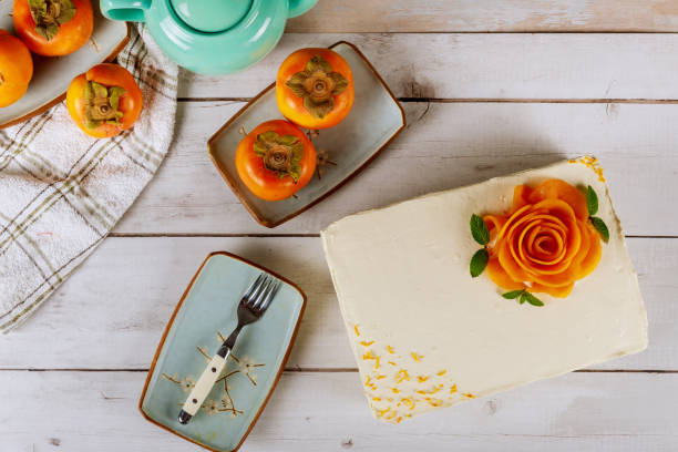 istock Creamy cake with wipped cream cheese and decorated with persimmon. 1193409406