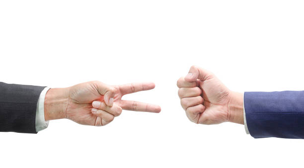 istock Rock Paper Scissors concept - Business hands isolated on white background 1193411662