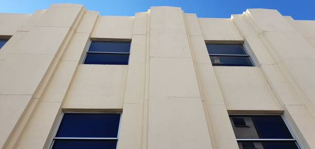 istock Pale yellow art deco styled building 1193416985