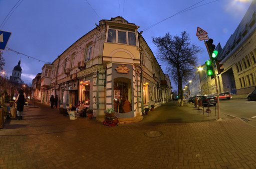 Historical area at dusk with illumination. Downtown. Podol district.December 10,2019. Kiev , Ukraine