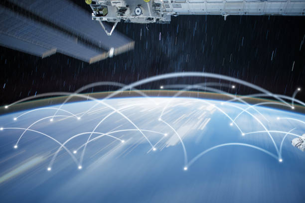 istock Wireless Network Connections of Earth with Satellite or Space Station in View 1193419692