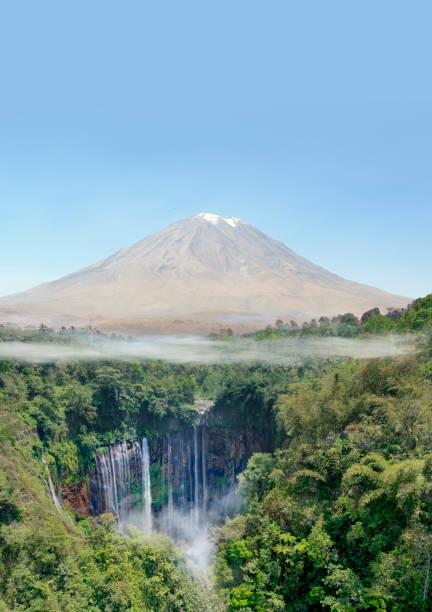 istock Waterfall, volcano and tropical rainforest in Indonesia 1193426510
