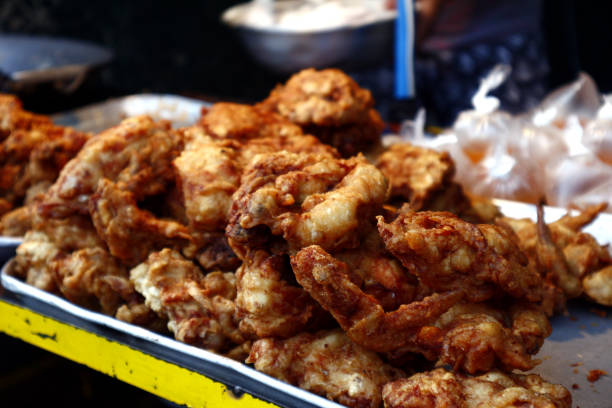 istock Freshly fried chicken at a food cart 1193427617