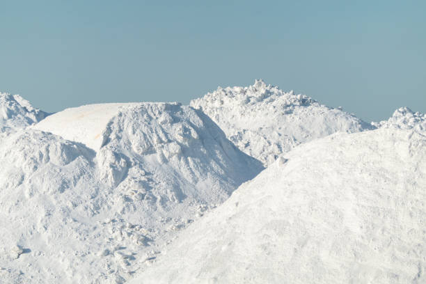 istock Large white snow hills piles background 1193427771