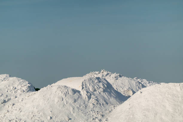 istock Large white snow hills piles background 1193427772