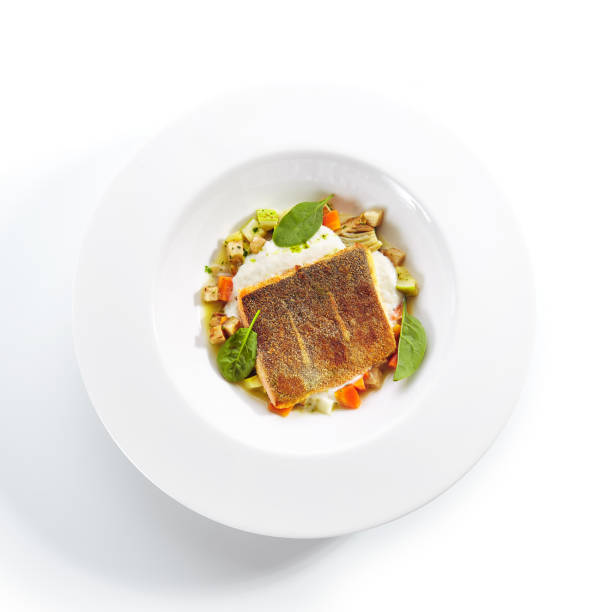 istock Fried Trout Fillet and Vegetable Stew with Herbs Espuma 1193429205