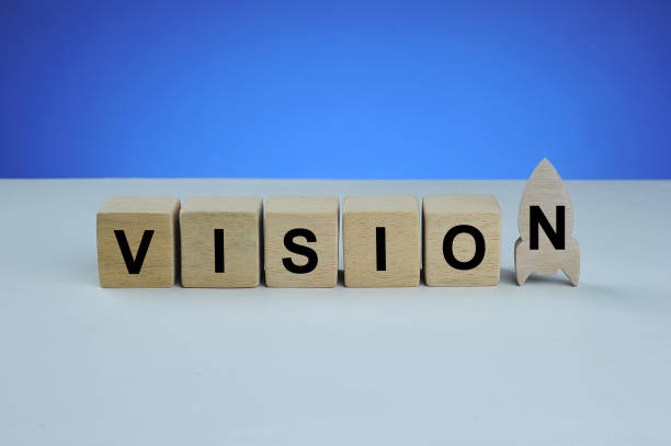 istock Vision word written on wood cube. With blue background 1193430852