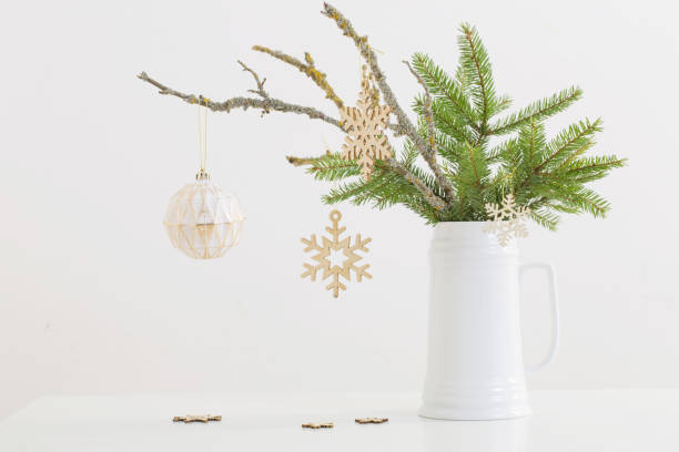 istock modern Christmas sill life in jug on white background 1193432673
