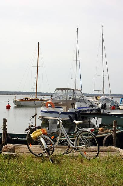 istock bicycles and yachts at harbor 119343284