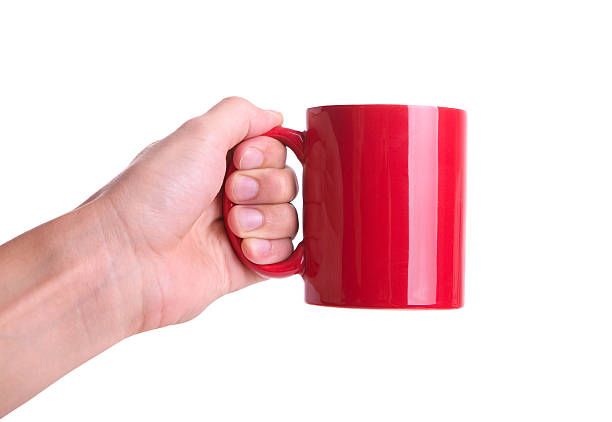 istock isolated hand holding big red coffee mug 119343689