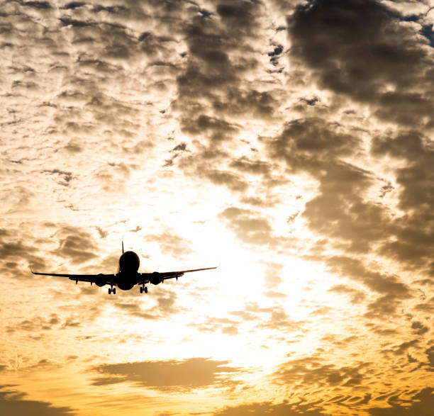 istock An airplane flying in cloud sky 1193438893