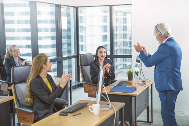 istock Group of young multiethnic diverse people gesture hand high five, laughing and smiling together in brainstorm meeting at office. Casual business with startup teamwork community celebration concept 1193438912