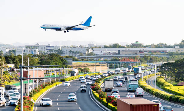Airplane flying over the highway