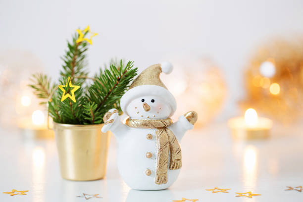 istock Christmas decorations with little ceramic snowman 1193443895