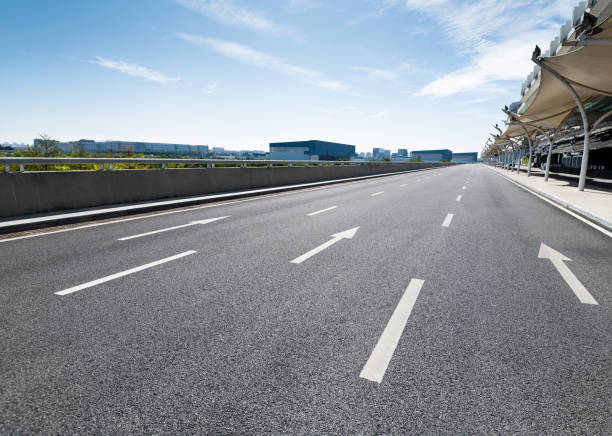 istock Arrow signs on asphalt road 1193444814